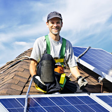 a strong roofer doing his work with smile