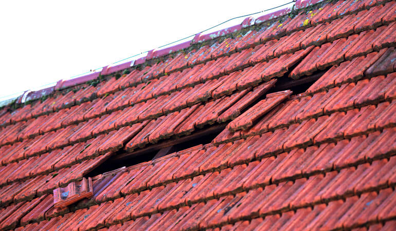 damaged asphalt roofing blog