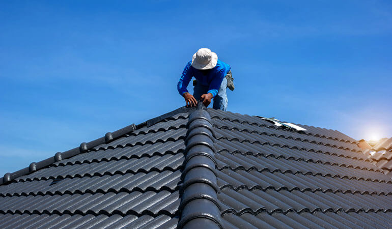 a roofer perform asphalt roofing