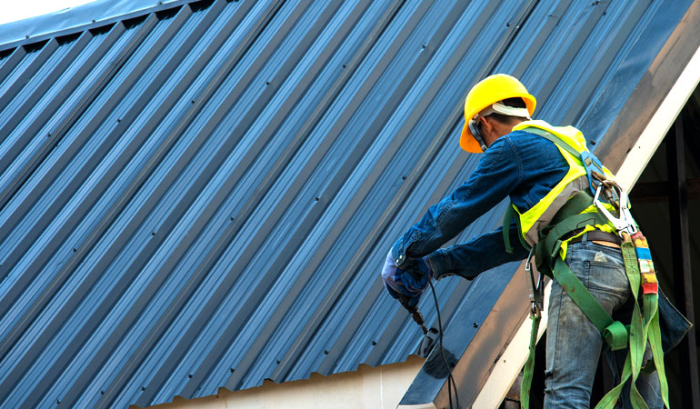 black roof with roofer