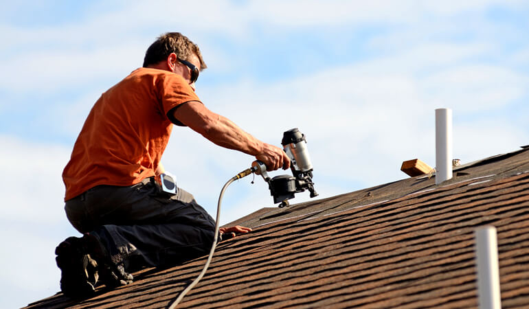 roofer with his work